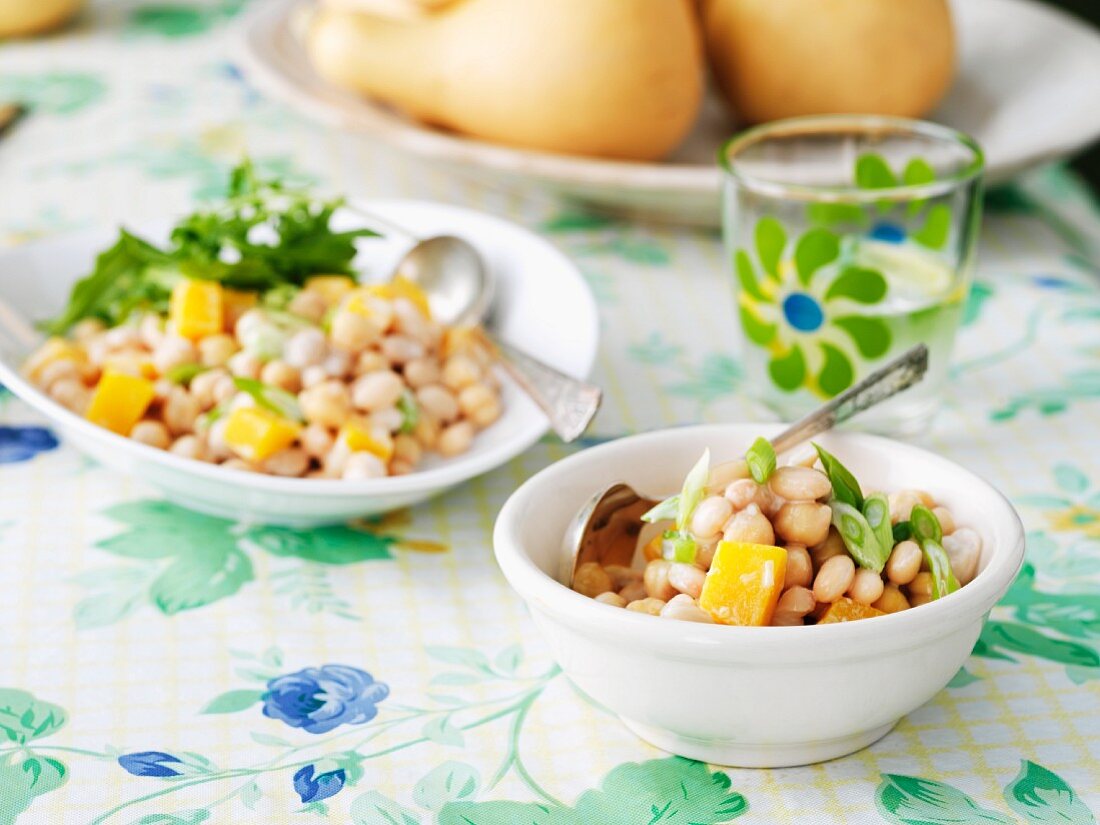 Vegetarian Bean Salad in Individual Bowl and Serving Bowl on Table
