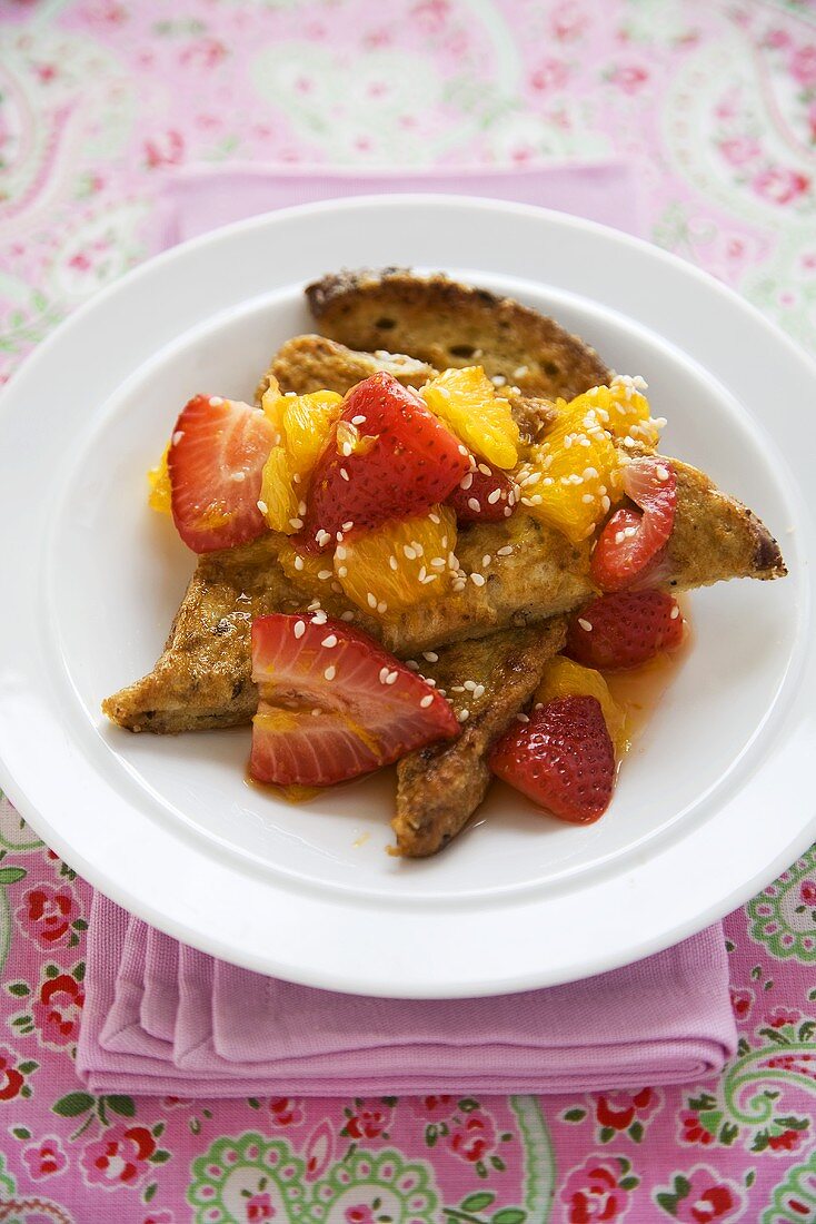 French Toast Topped with Warm Strawberries and Oranges