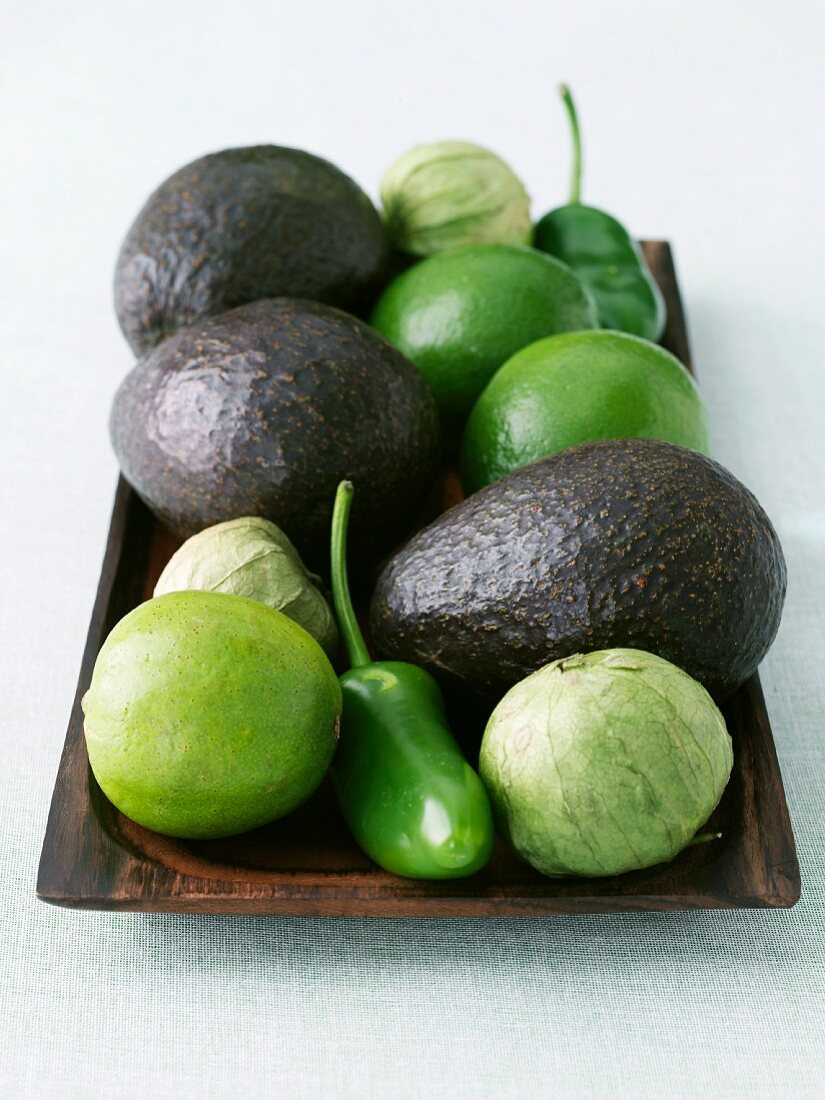 Platter of Avocados, Tomatillos, Limes and Jalapenos