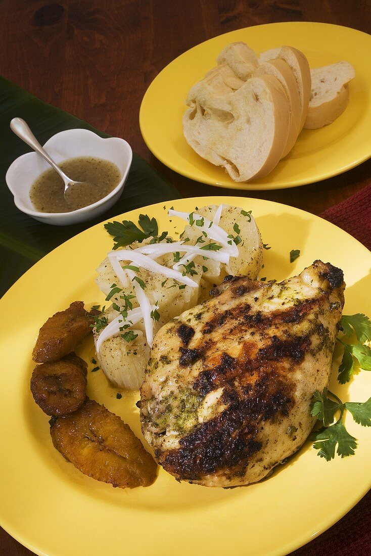 Grilled Chicken Adobo, Yuca with Mojo, and Maduros (fried plantains)