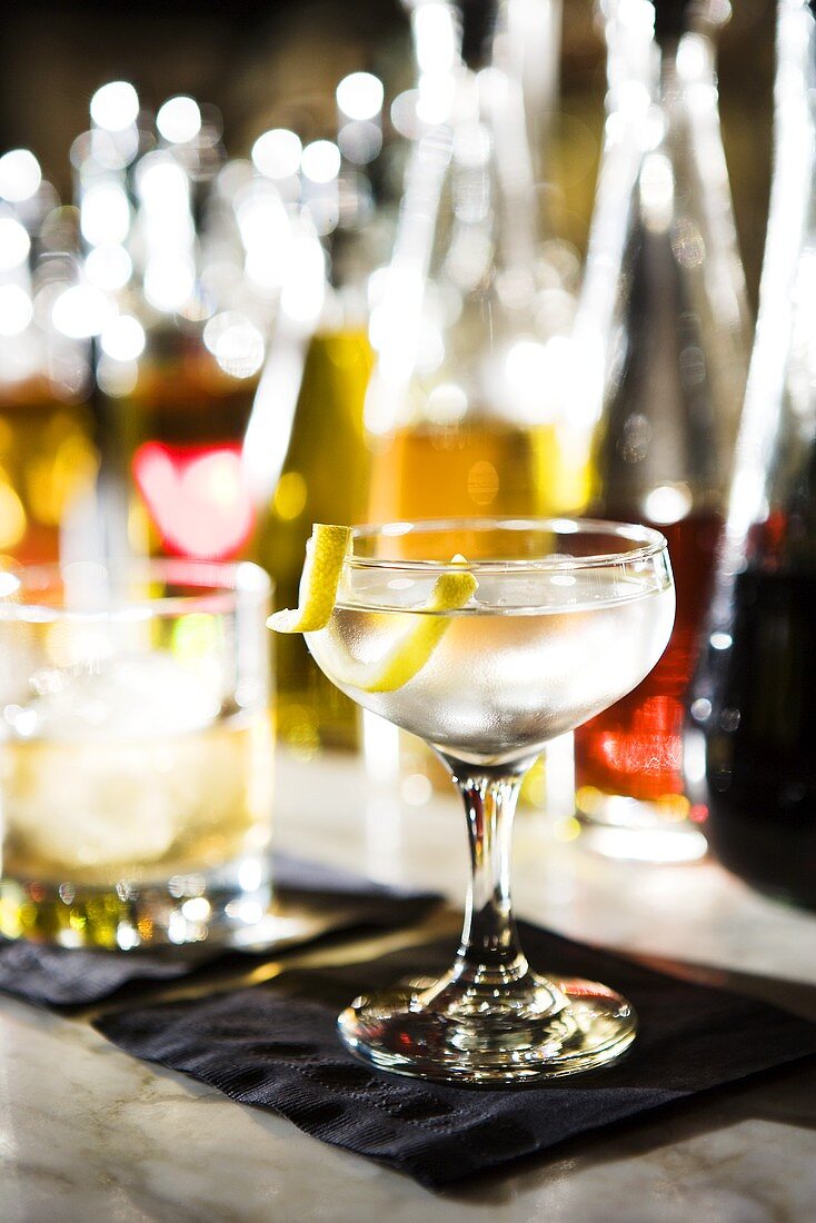 Martini with Lemon Twist on Bar