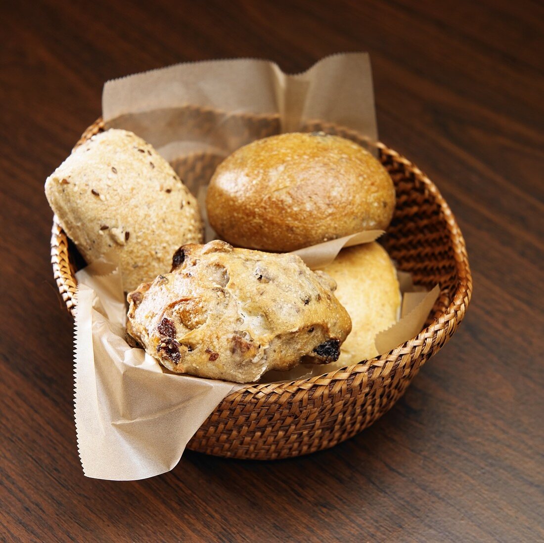 Variety of Rolls in a Basket; Olive, Pecan Raisin and Sourdough