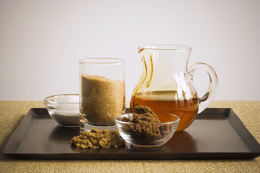 Assorted Types of Sugar with Honey on a Tray