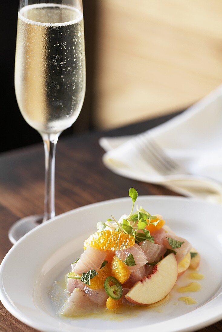 Raw Fish and Fruit Salad; Champagne