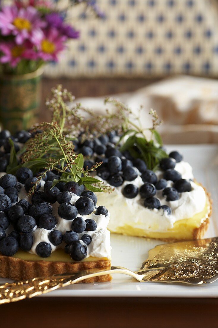 Lemon Tart with Blueberries and Cream; Slice Removed 