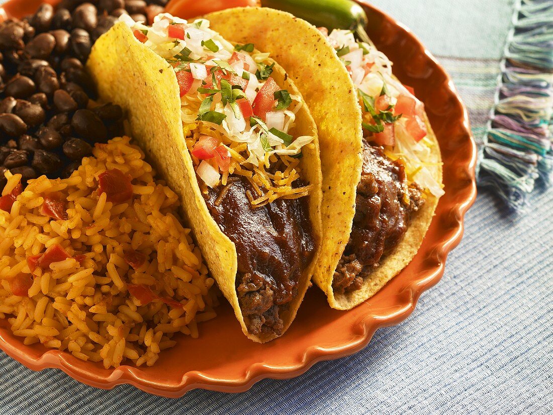 Two Beef Tacos with Rice and Beans