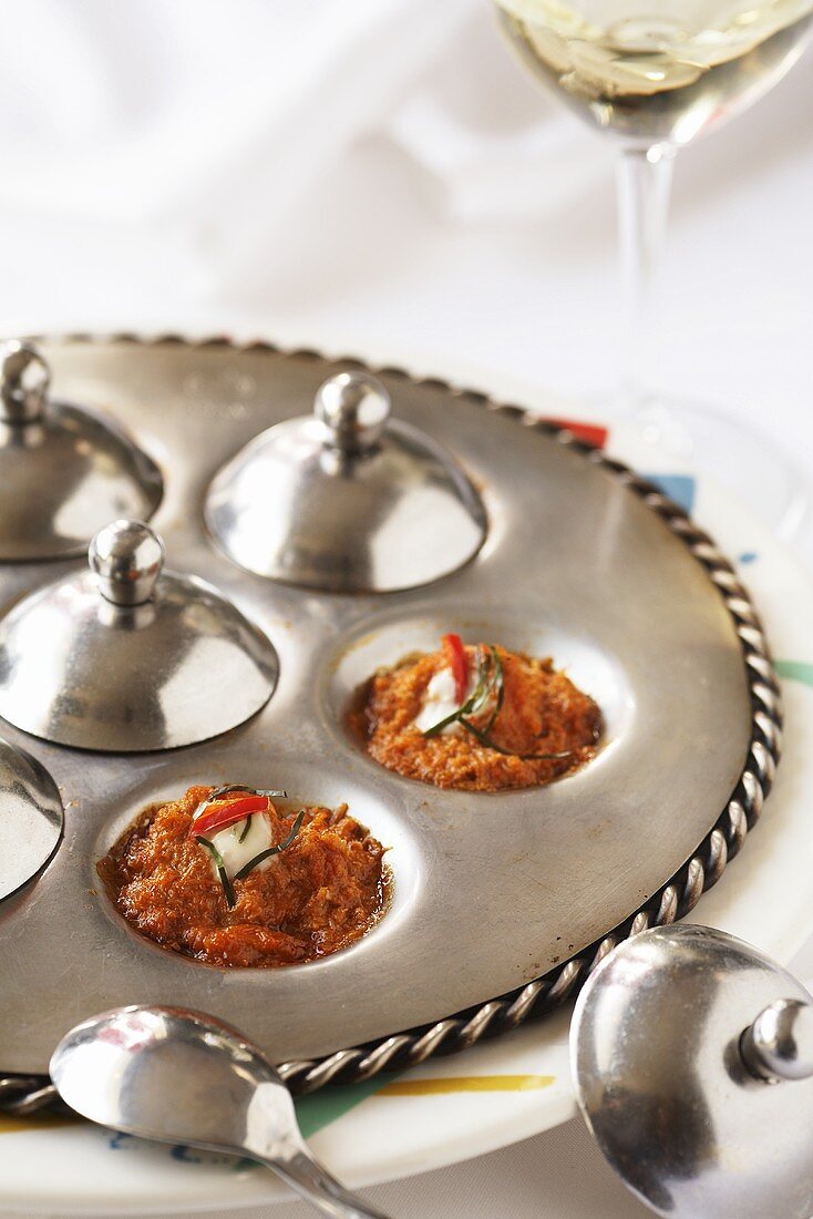 Spicy Tomato Curry on Silver Serving Platter