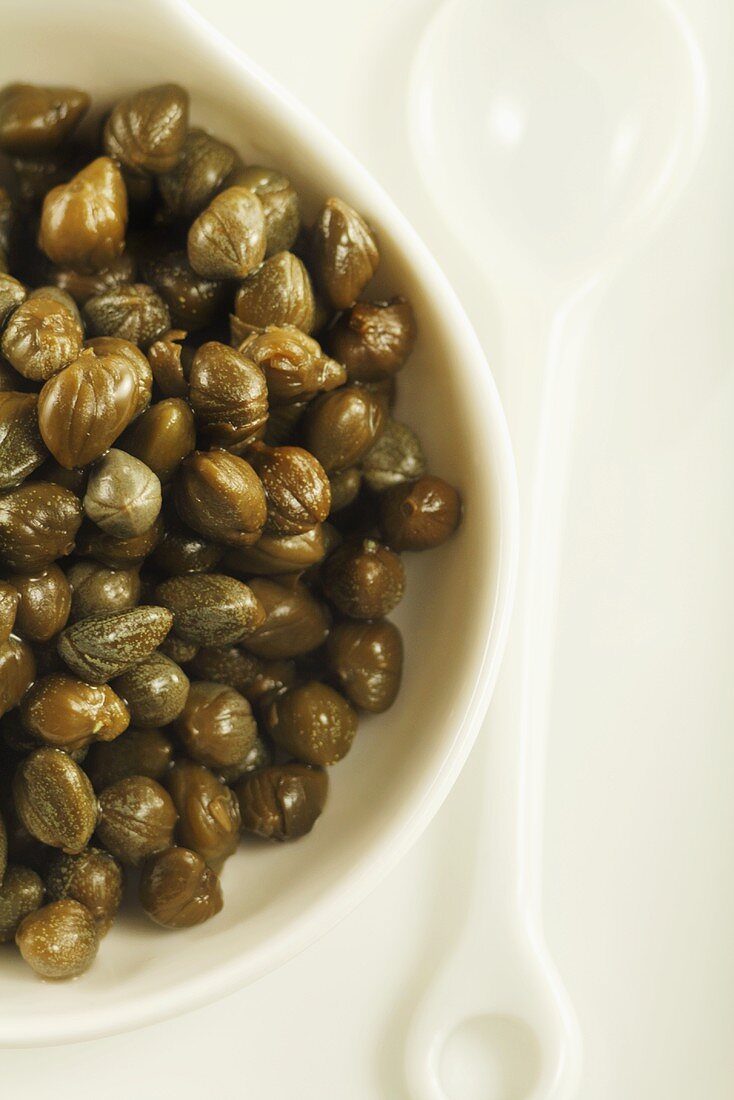 Bowl of Capers with Spoon; From Above