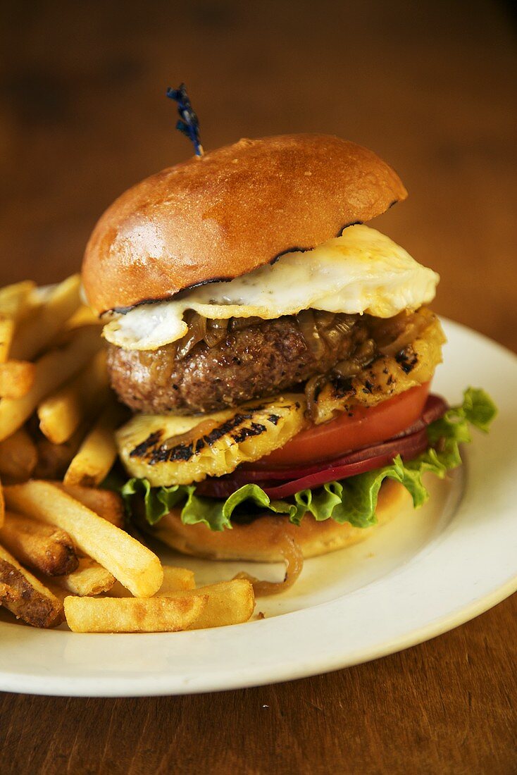 Australian Burger with Fried Egg, Pineapple and Beets; Fries