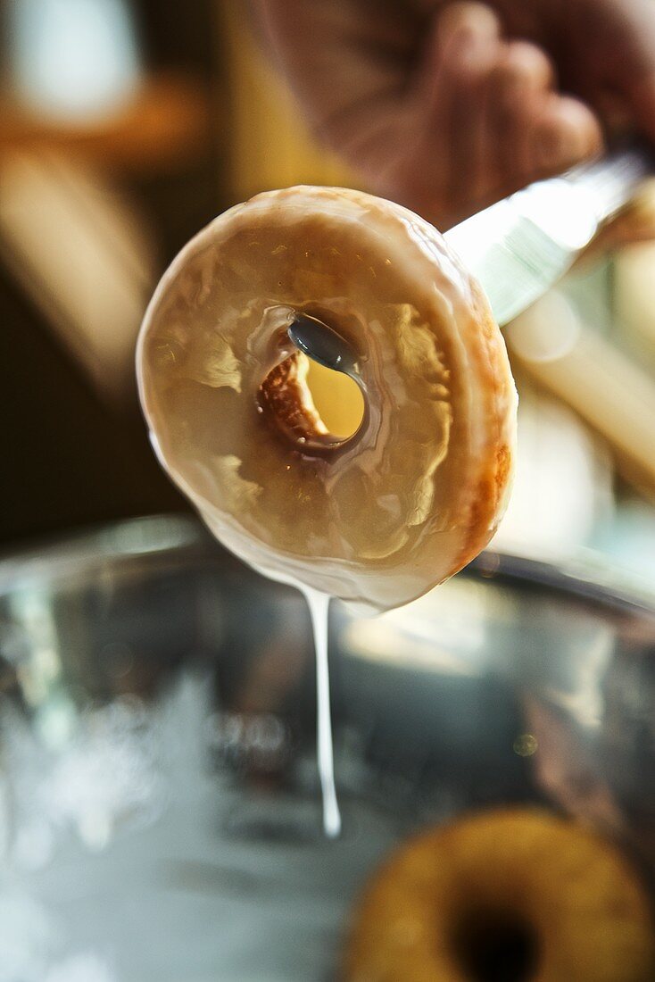 Fresh Made Glazed Donuts; Glaze Dripping