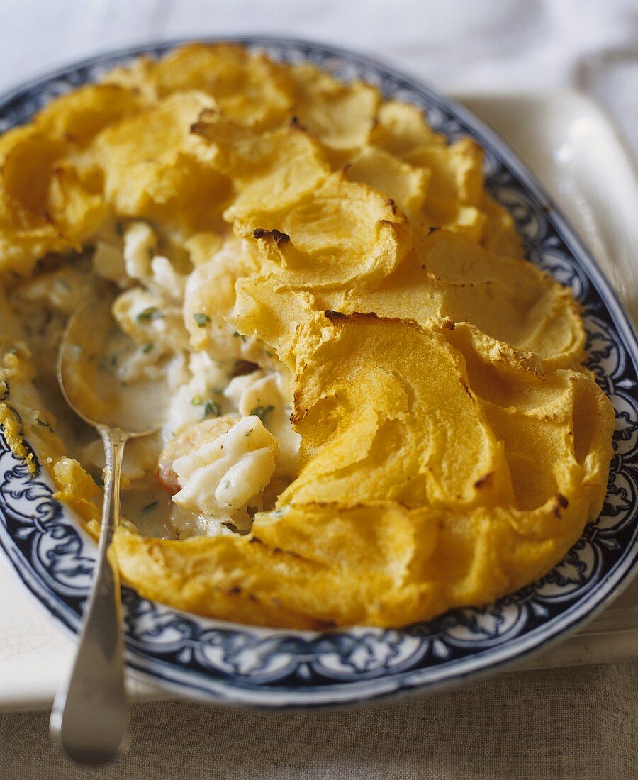 Baked Fish Pie with Scoop Removed