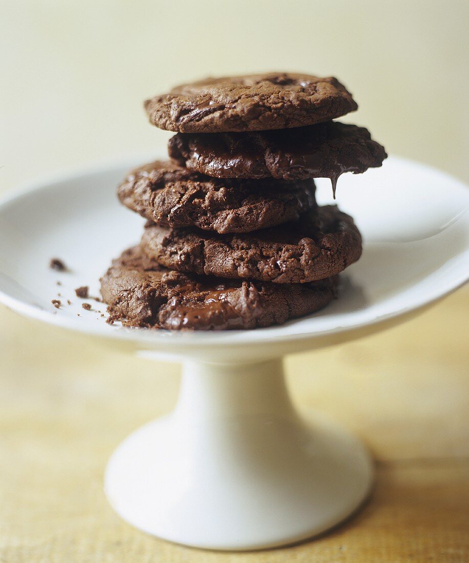 Stacked Chocolate Cookies on White Pedestal Dish