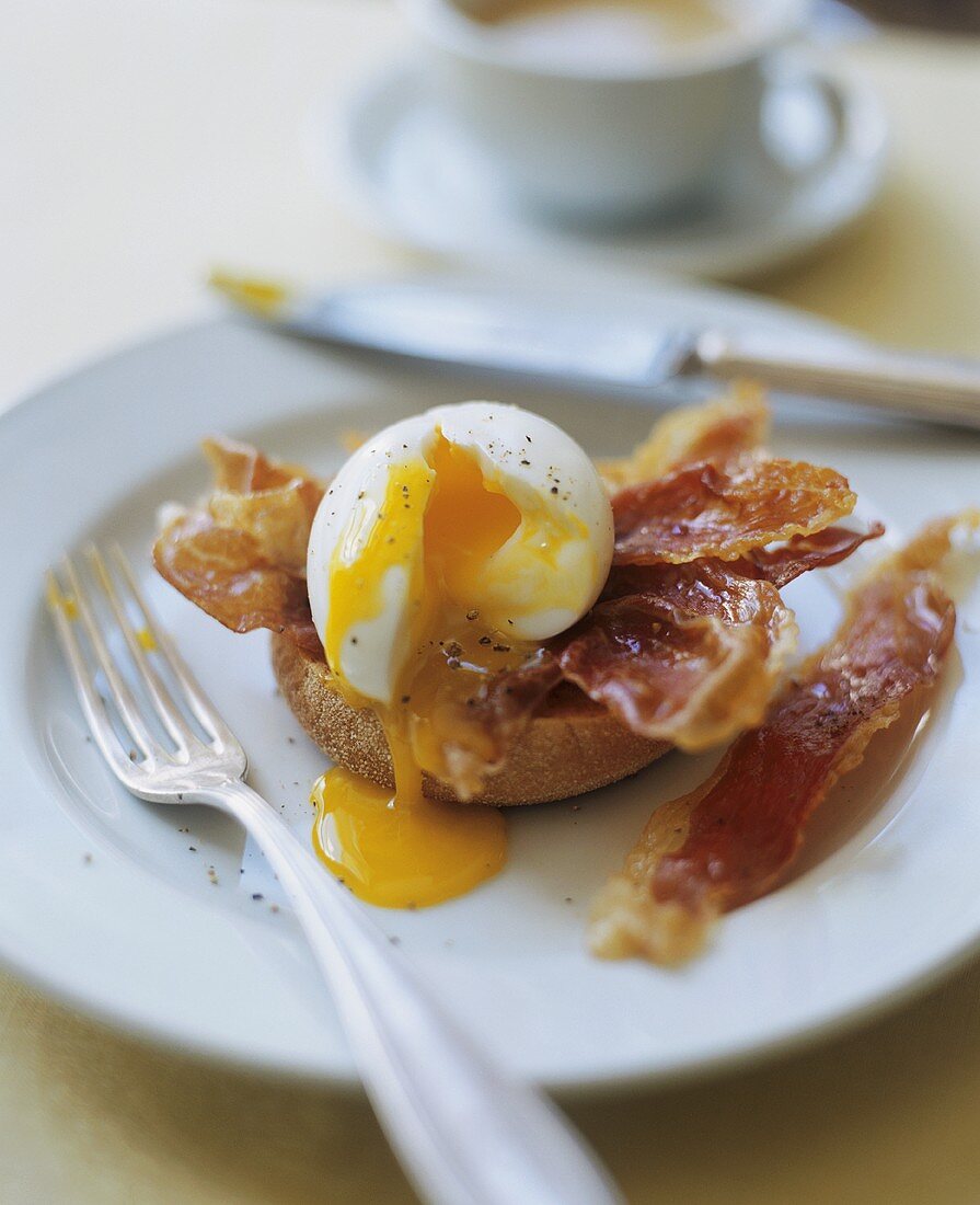 Soft Boiled Egg with Bacon on an English Muffin