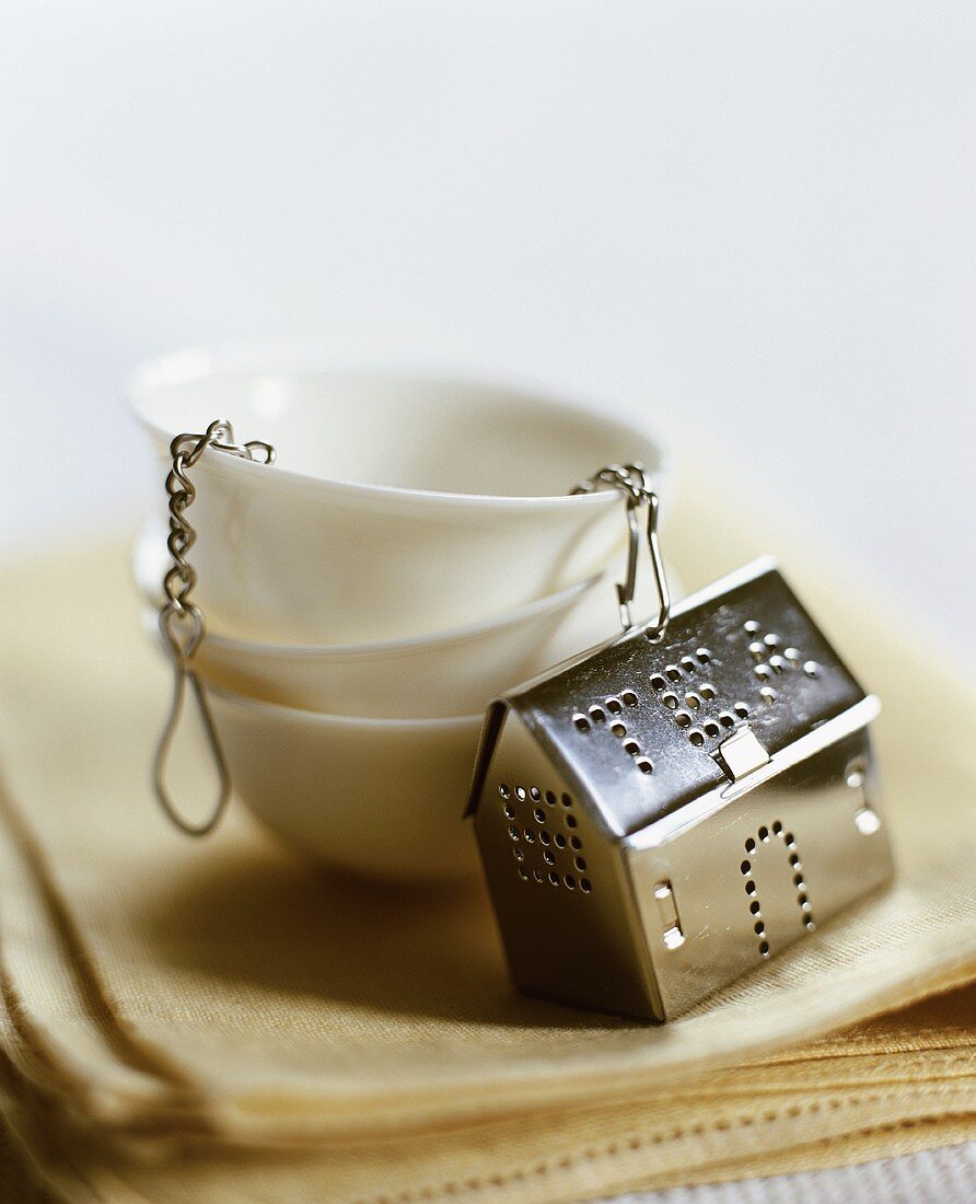 Tea Strainer with Stacked Small Cups