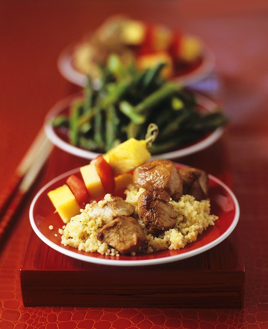 Indonesian Pork Satay with Couscous and Tropical Fruit