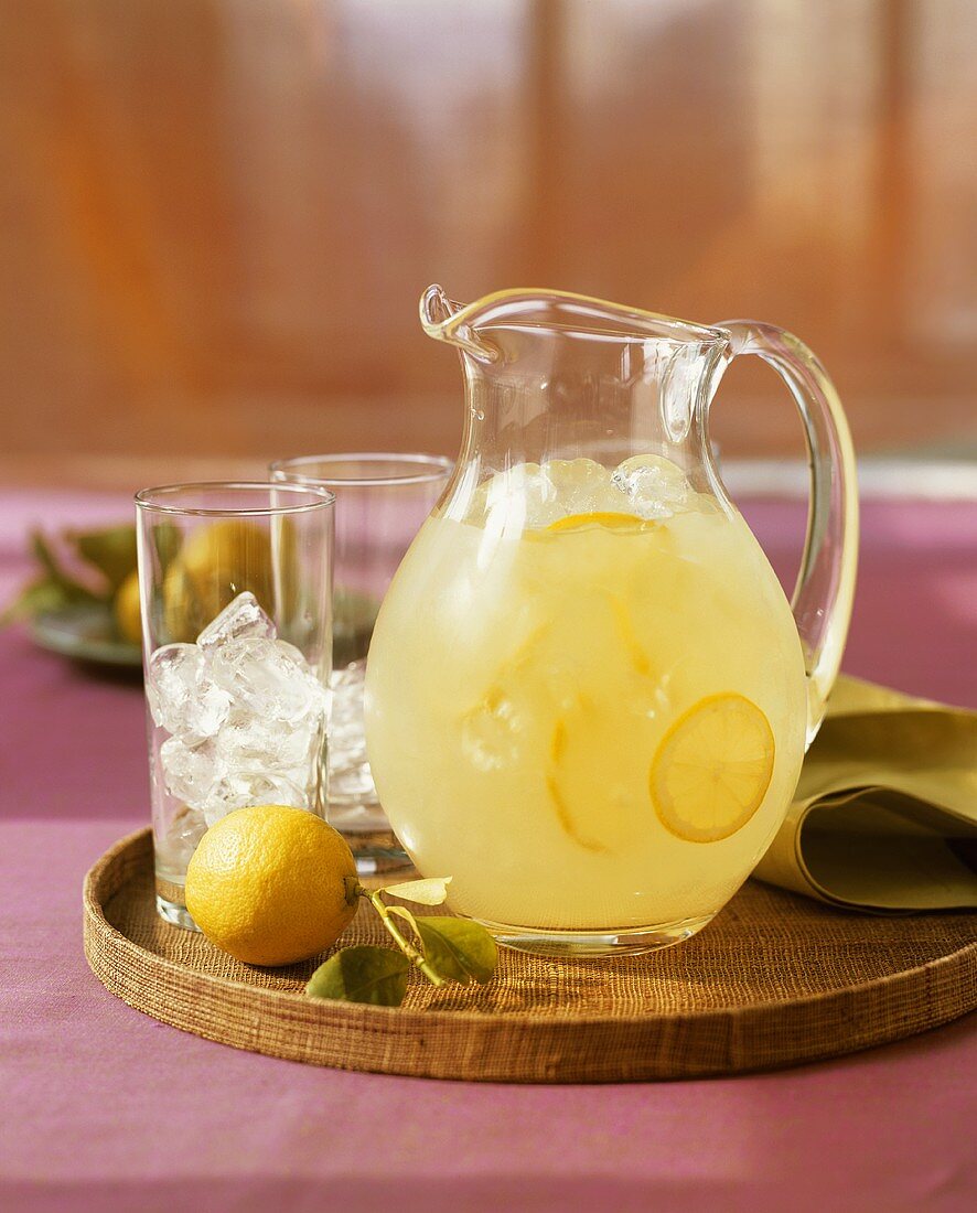 Pitcher of Lemonade with Glass with Ice