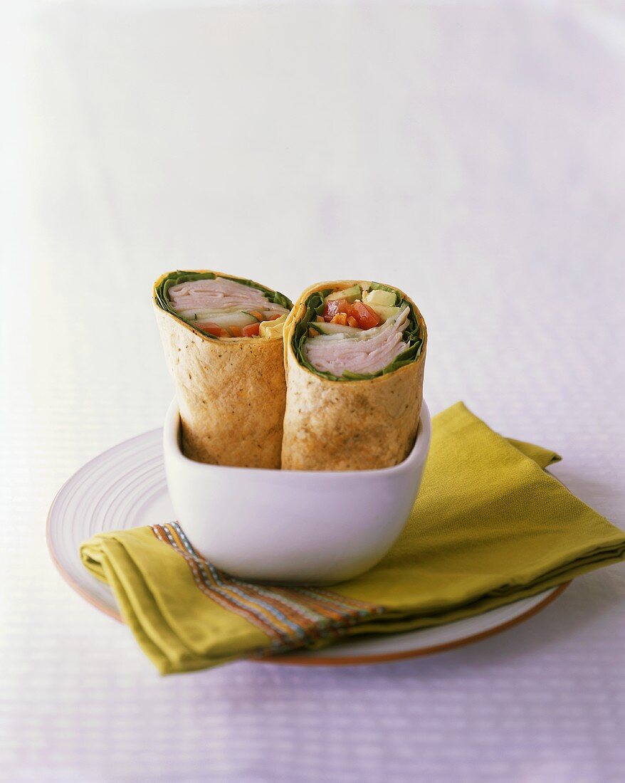 Turkey and Veggie Wrap Halved in a Bowl