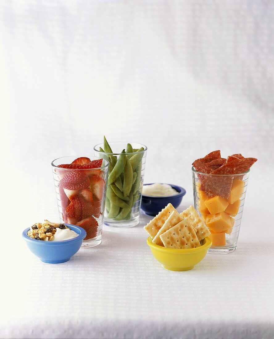 Assorted Snacks in Bowls and Cups