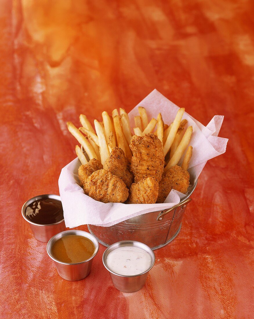 Fried Chicken Tenders with French Fries and Dipping Sauces