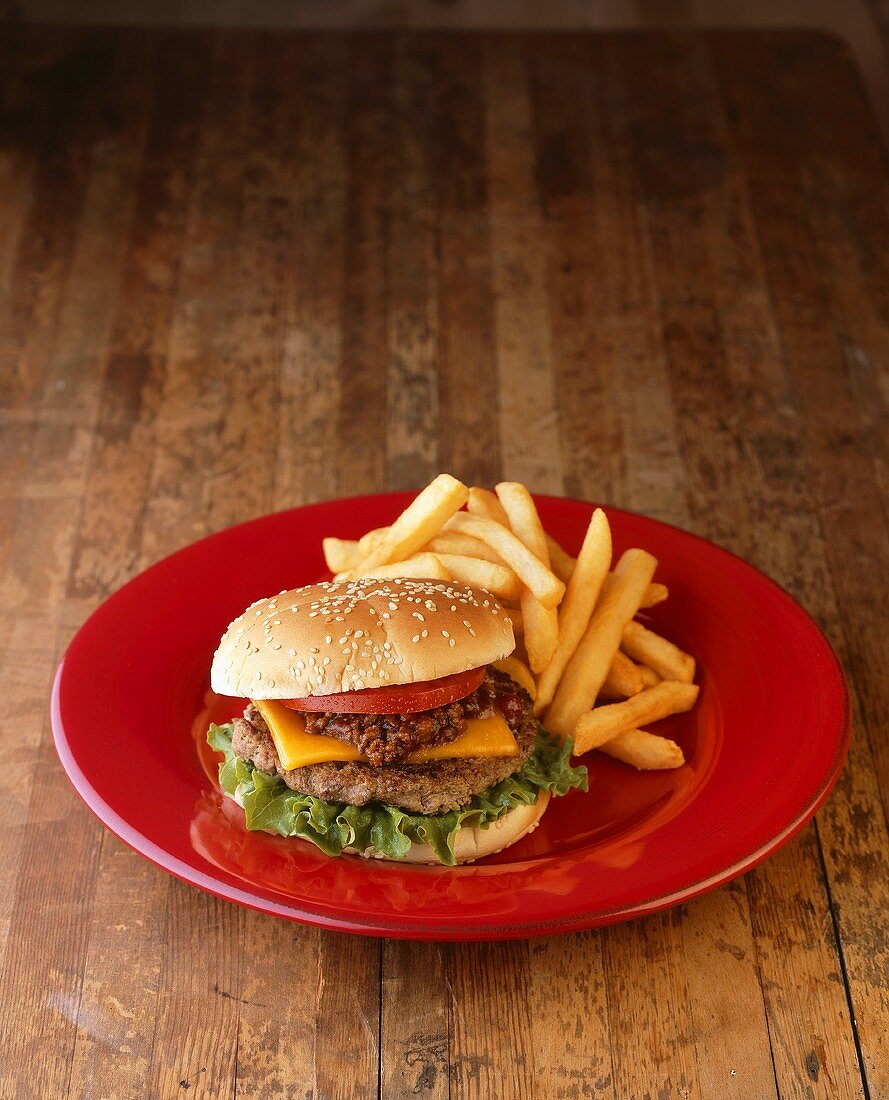 Cheeseburger and Fries on a Red Plate