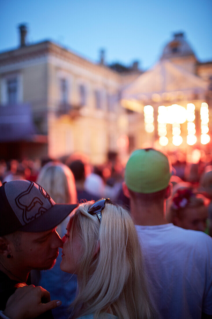 Kiss at a concert, summer fest in the garden of Piens (Milk Club), Briana Iela 9, Riga, Latvia