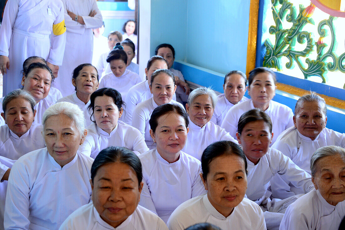 Women in the cathedral of Tay Ninh, Vietnam, Asia