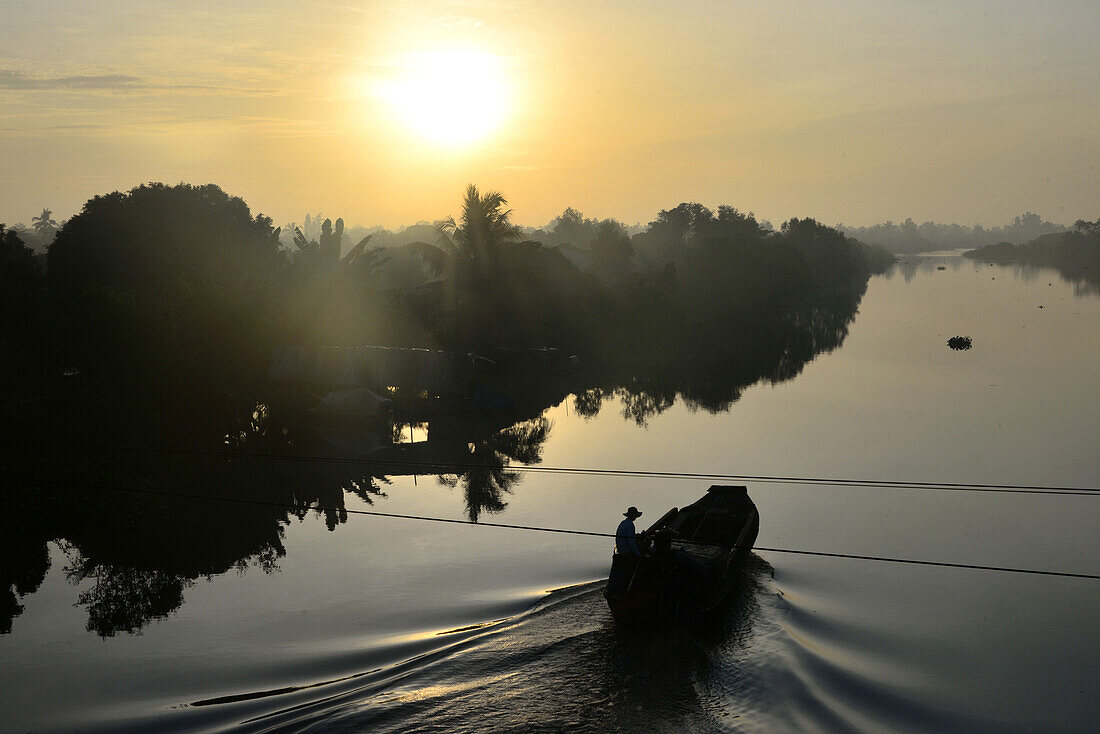 Sunset in An Binh in the delta of Mekong river, Vietnam, Asia