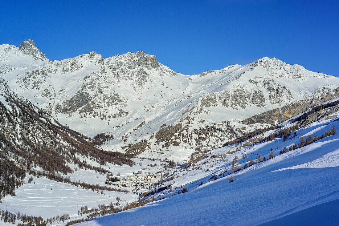 View to Val Varaita with Chianale, Tete des Toilliers in the background, Rocca Bianca and Pic de Caramantan, Punta Tre Chiosis, Valle Varaita, Cottian Alps, Piedmont, Italy