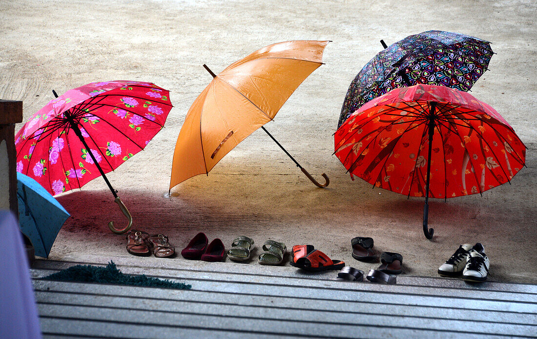 Umbrellas at Wat Wangka Wiwekaram near Sangkhlaburi at Khao Laem reservoir, center-Thailand, Thailand