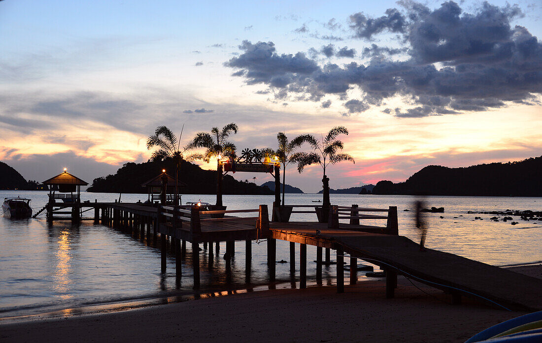 Pier at sunset, Krathueng beach, Island of Mak, Golf of Thailand, Thailand