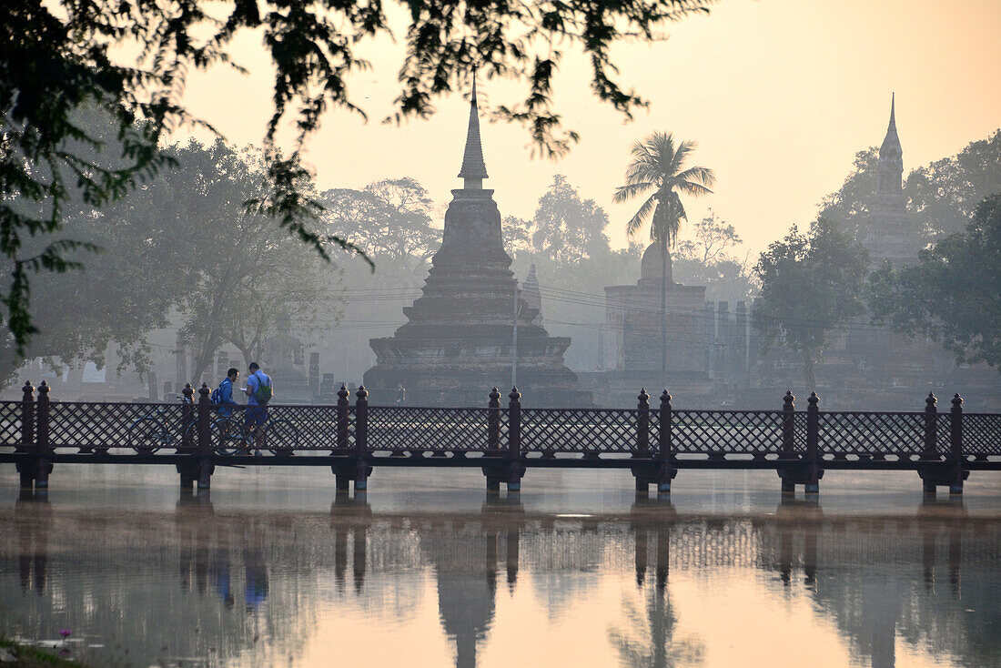 Wat Tranpang Ngoen and reflection in a lake, Old-Sukhothai, Thailand
