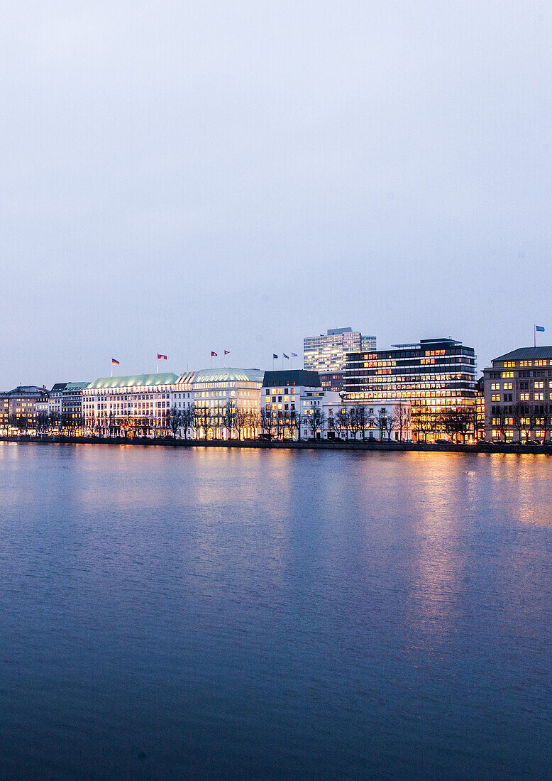 view over the Binnenalster to Jungfernstieg at dusk at Christmas, Hamburg, Germany