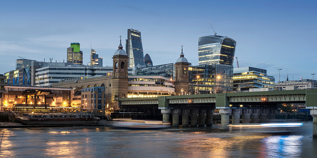 City of London. Financial district office buildings in the City of London, River Thames at Twilight