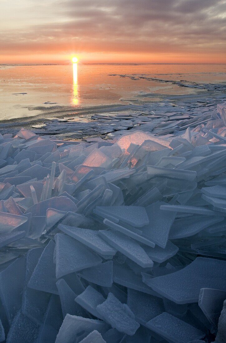 Landscape of geometric drift ice at sunset, Warder, Netherlands