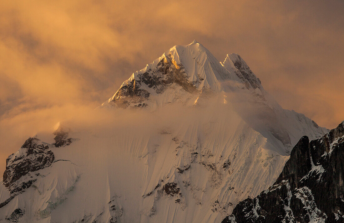 Yerupaja summit ridge, 6617 meters, at sunset, Cordillera Huayhuash, Andes, Peru