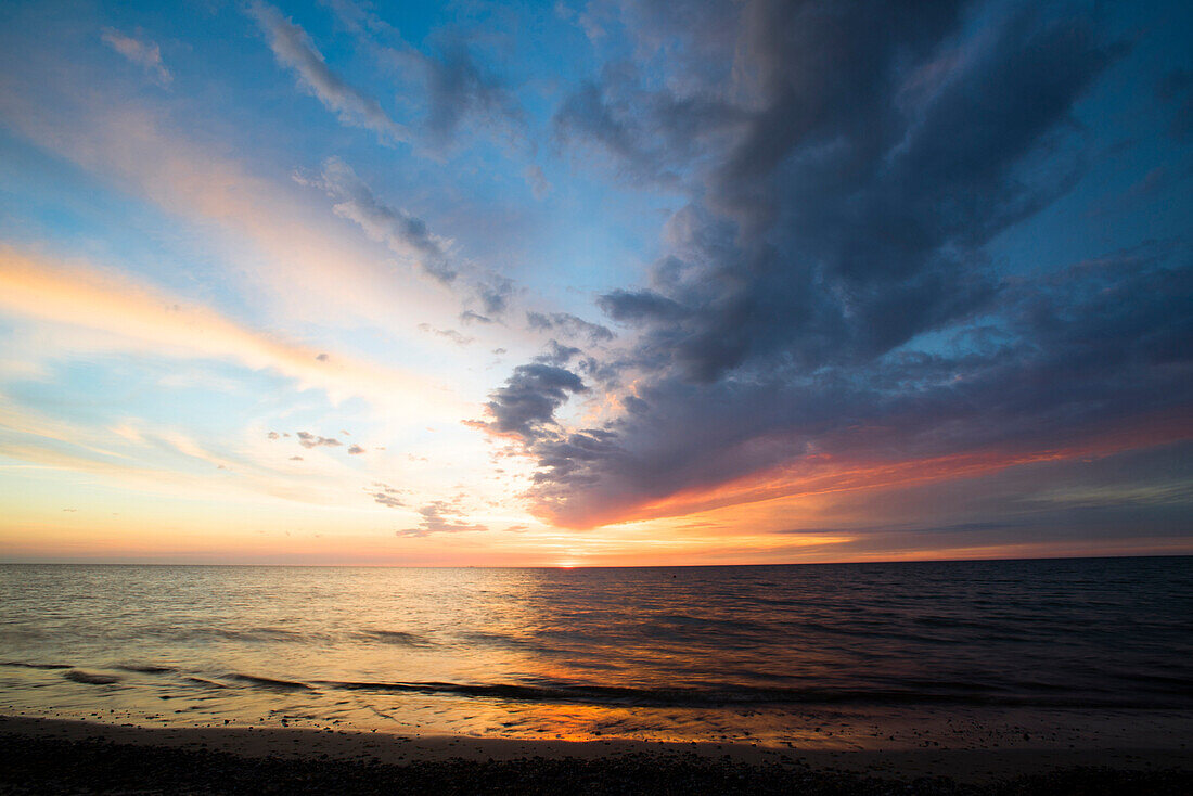 Sea view at sunset on a Baltic Sea beach, Ahrenshoop, Mecklenburg Vorpommern, Germany