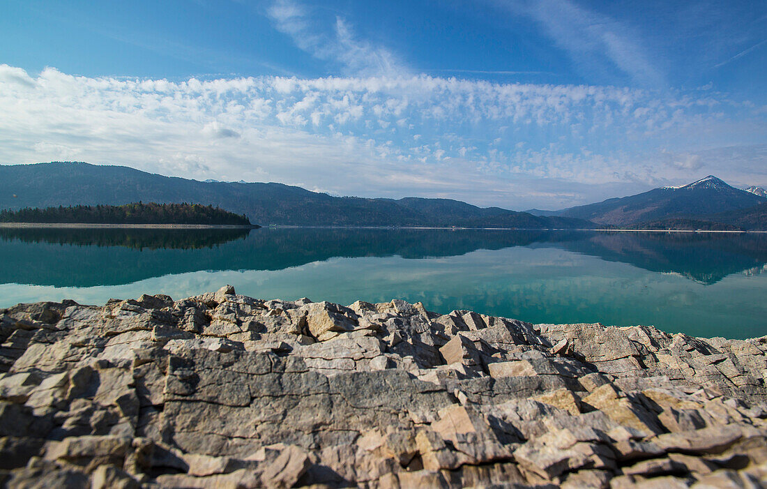 Rocky shore at Lake Walchensee with views of the island Sassau in lake Walchensee, Lake Walchensee, Alps, Upper Bavaria, Bavaria, Germany