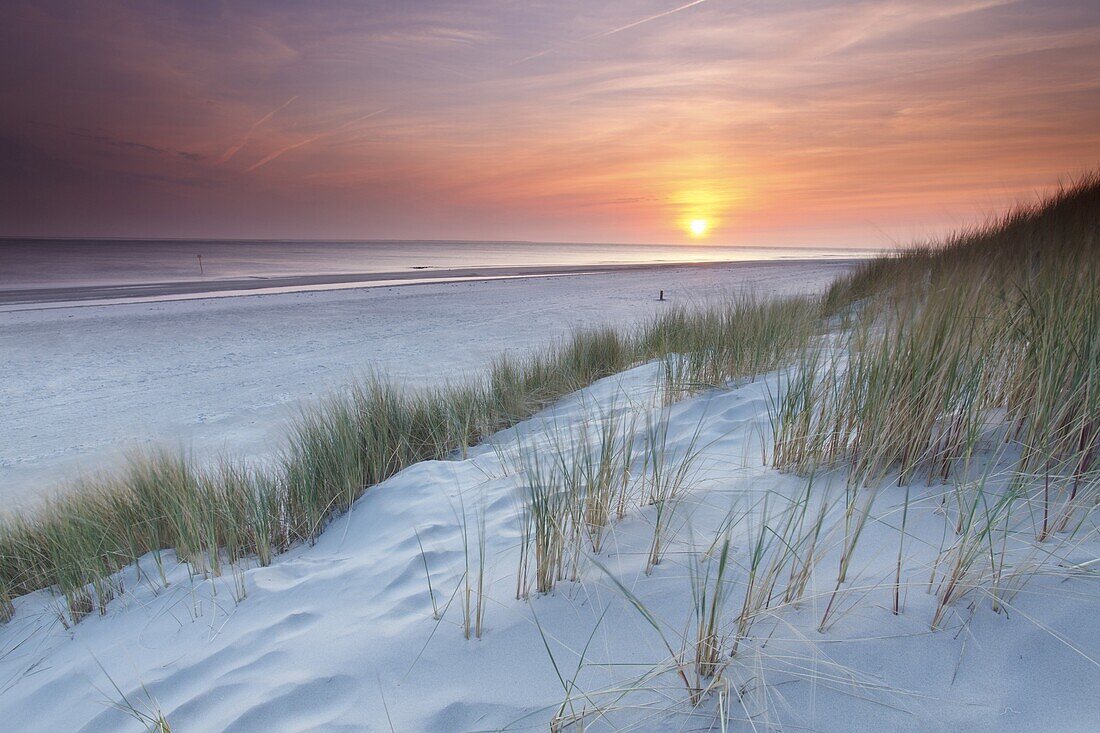 Sunset over the North Sea as seen from the dunes of Ameland, Netherlands