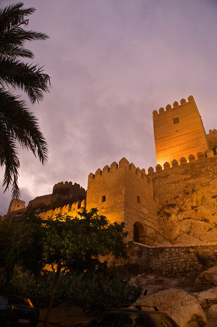 Moorish fort lit in the evening light, Alcazaba in Almeria, Andalusia, Spain