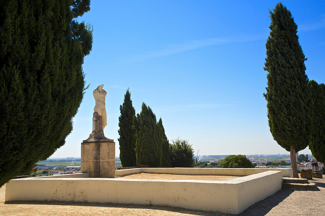 Roman settlement Italica near Seville, statue and cedar trees, Sevilla, Andalusia, Spain, Europe