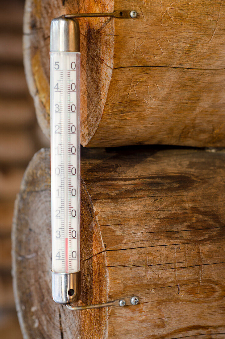 A thermometer indicating minus 30 degrees Celsius,Hut, Urho Kekkonen National Park, finnish Lapland, Finland