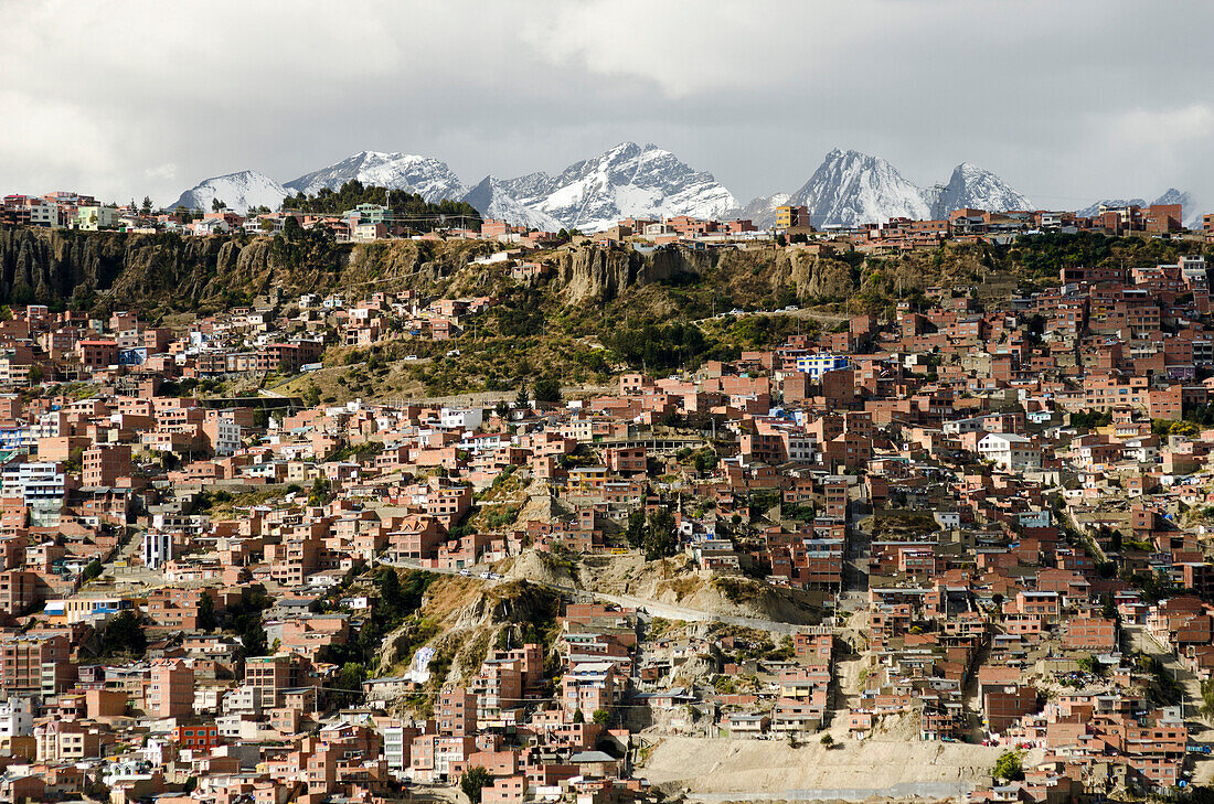 The upper parts of the city of La Paz with surrounding summits of the Andes, Bolivia