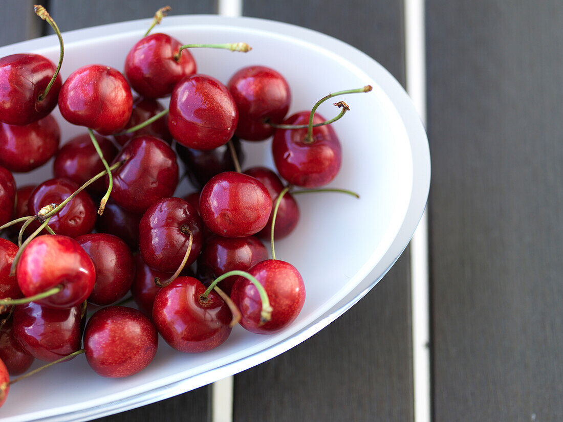 Red cherries on a porcelain plate, Mallorca, Spain