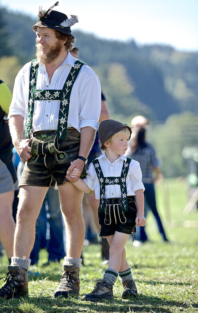 Man and boy wearing traditional clothes, Viehscheid, Allgau, Bavaria, Germany