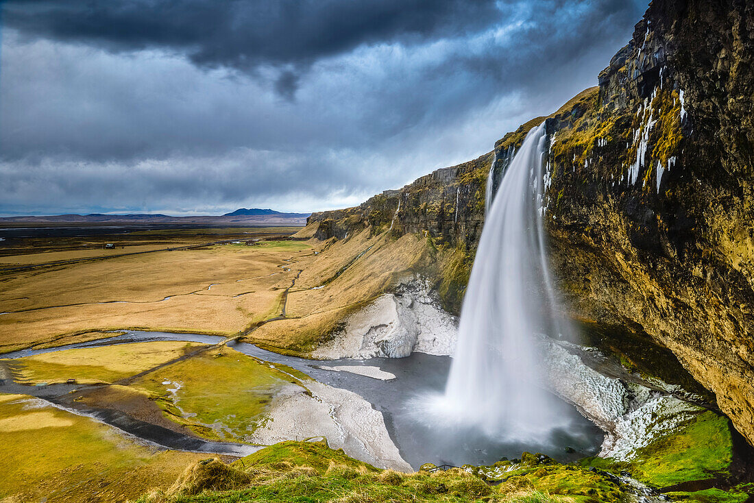 Waterfall Seljalandsfoss of river, Seljalandsa, located at ring road near Skogar, below glacier Eyjafjallajökull, Southern Iceland, Iceland, Europe
