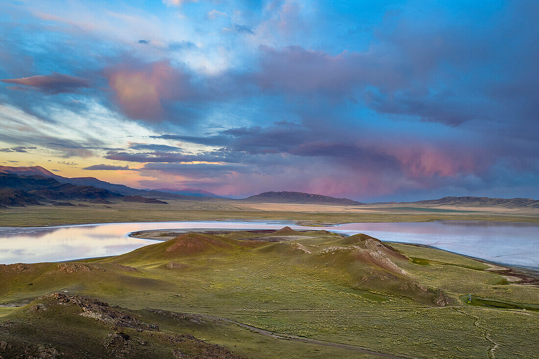 Sunset over steppe and mountain landscape, Tuzkoel Salt Lake, Tuzkol, Tien Shan, Tian Shan, Almaty region, Kazakhstan, Central Asia, Asia