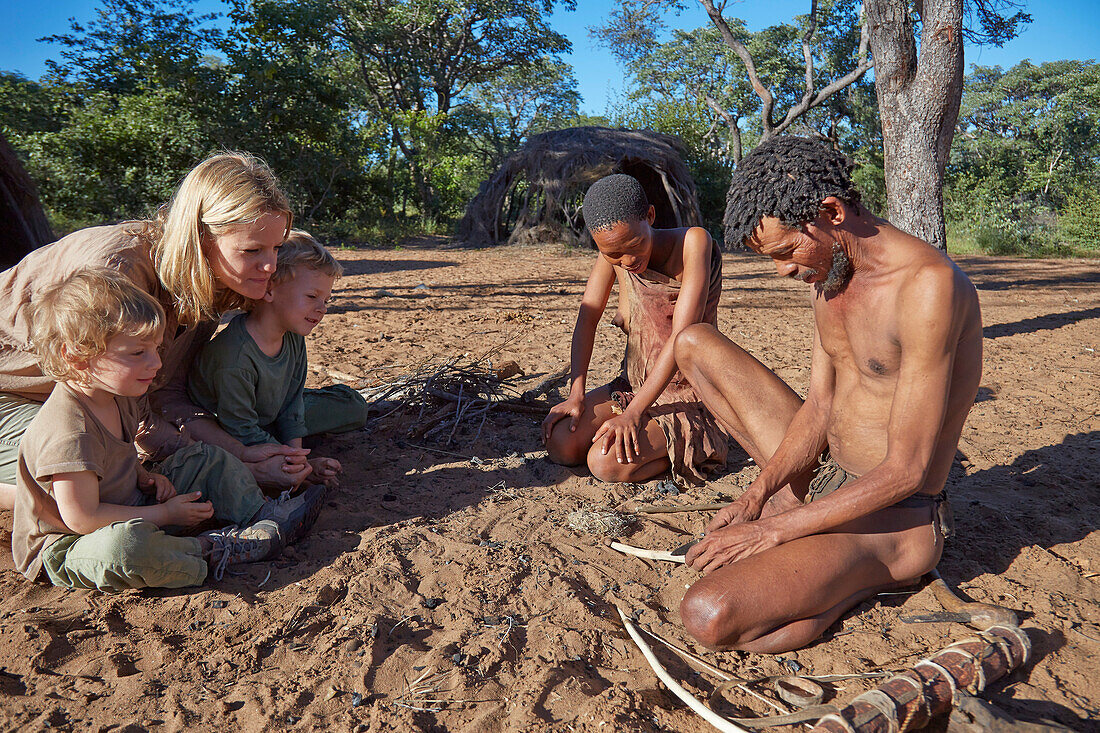 Tourists visiting a San people village, Khaudum, Namibia