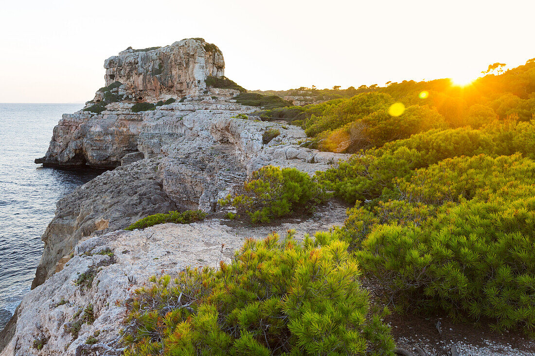 Coastal landscape at Calo des Moro at sunset, Mediterranean Sea, near Santanyi, Majorca, Balearic Islands, Spain, Europe