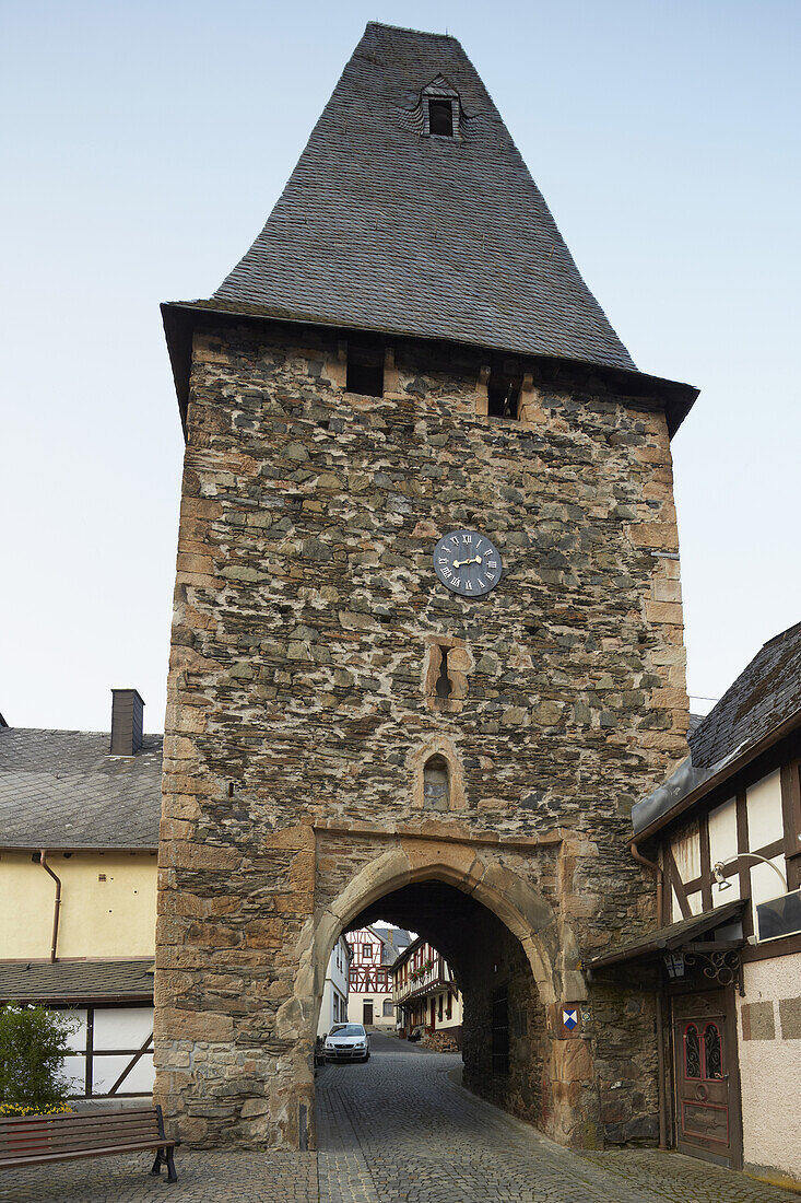 Half-timbered houses and gateway of the 12th century clock tower in Herrstein, Administrative district of Birkenfeld, Region of Hunsrueck, Rhineland-Palatinate, Germany, Europe