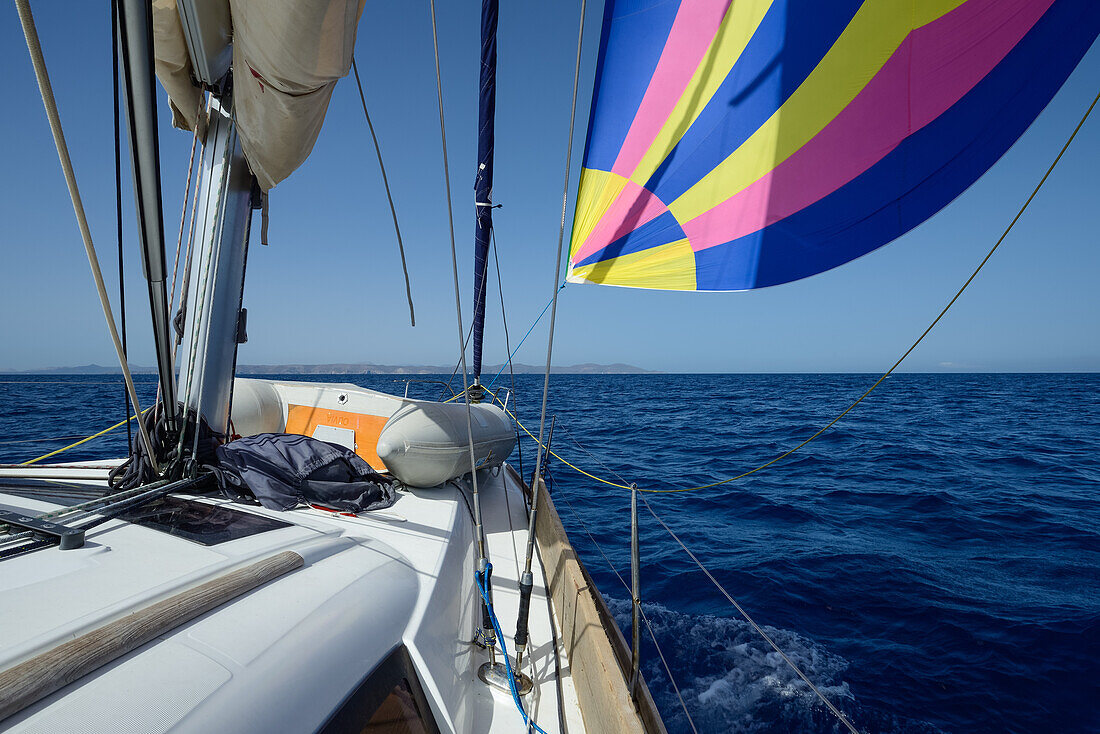Sailing yacht with Gennaker sail between the Greek Islands, Aegean, Cyclades, Greece